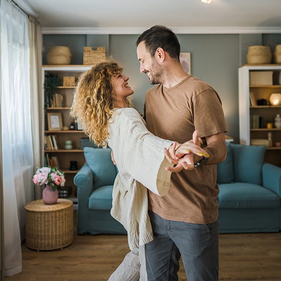 personal borrowing couple dancing in house